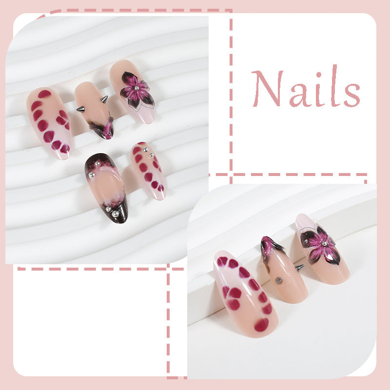 Acrylic nail set with elegant floral design and glossy accents Kalsten