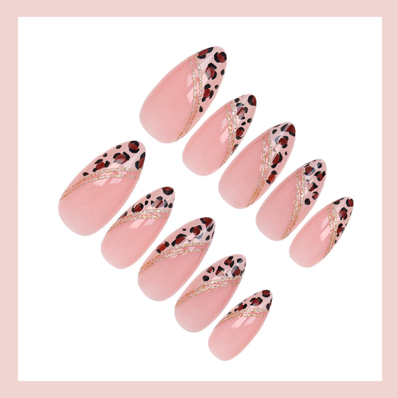 Acrylic nail set with glamorous animal print and elegant accents Kalsten