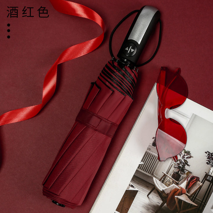 Women's foldable umbrella with 12 sturdy ribs and elegant design Kalsten