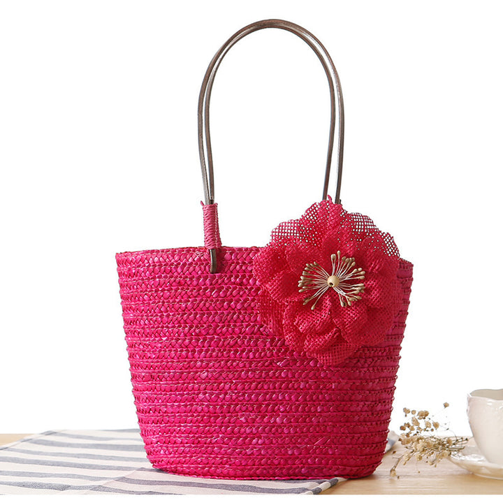 Elegant bast bag with flower appliqué Kalsten