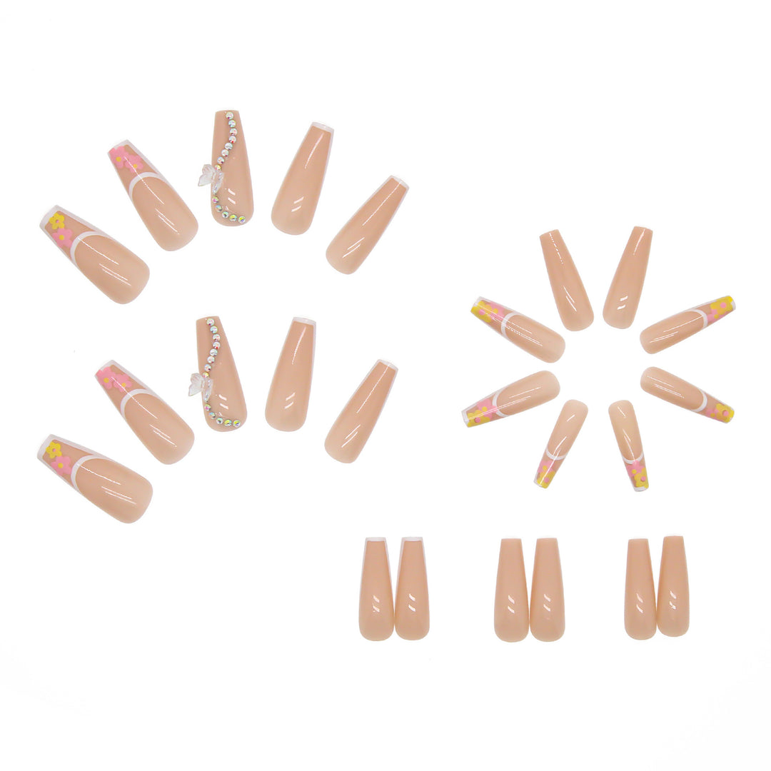 Artificail nail tips in elegant French design with floral accent Kalsten