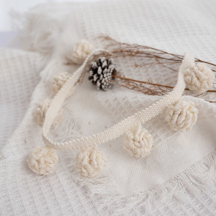 Decorative border with pompons Kalsten