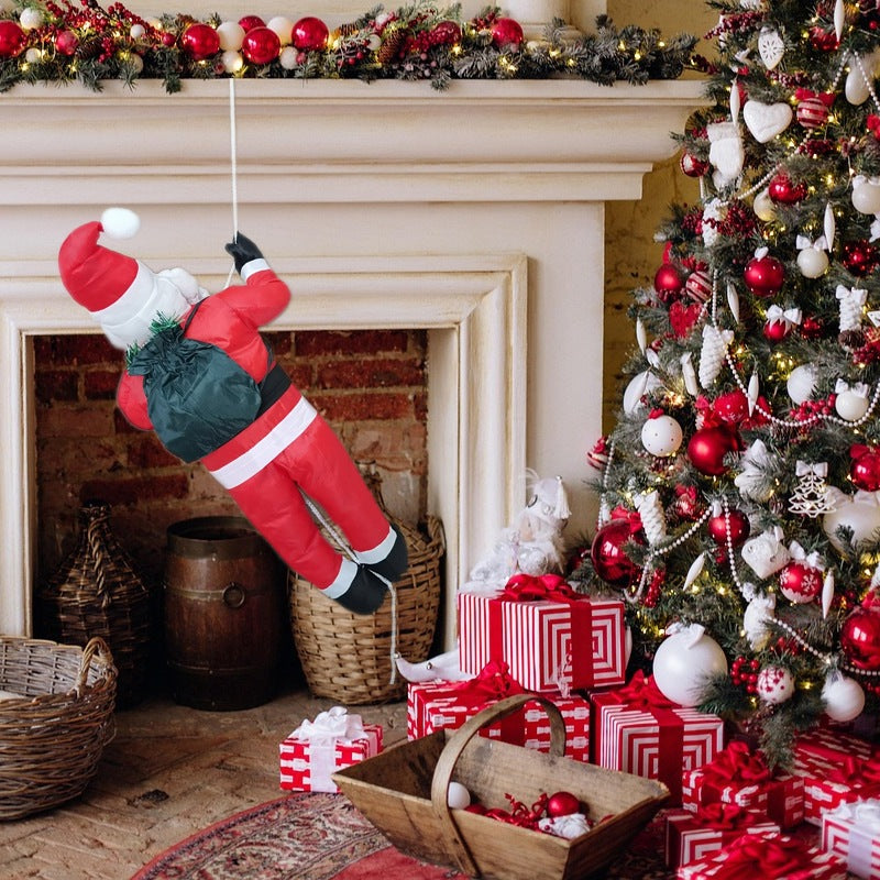 Inflatable Santa Claus figure on ladder