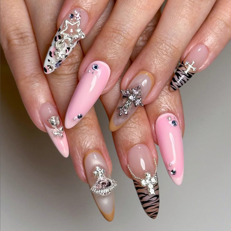 Artful stiletto nails with glitter and rhinestone embellishments Kalsten