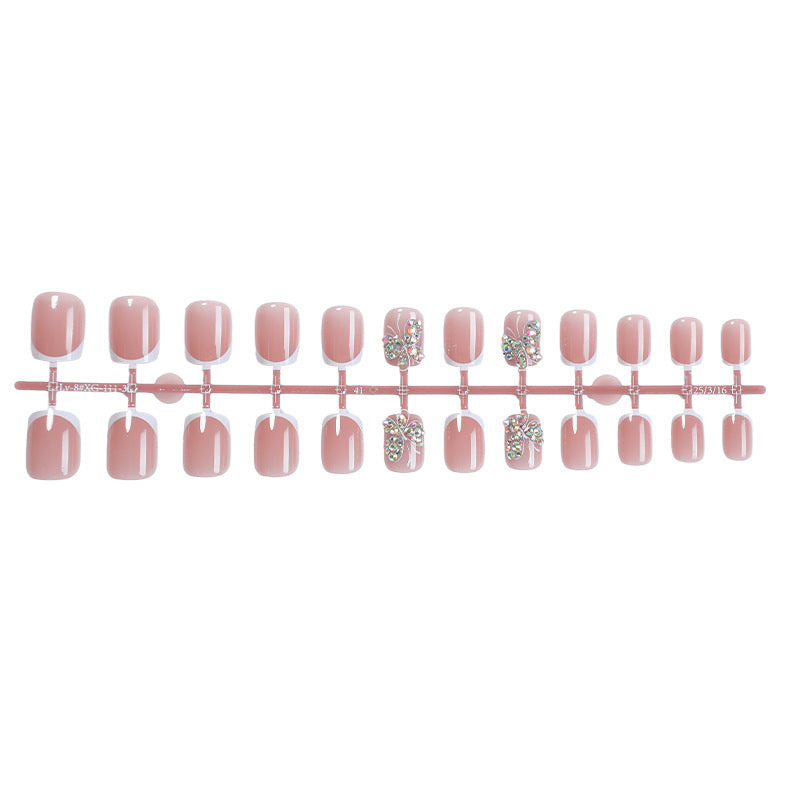 Artifical nail set with sparkling accents and elegant bows Kalsten