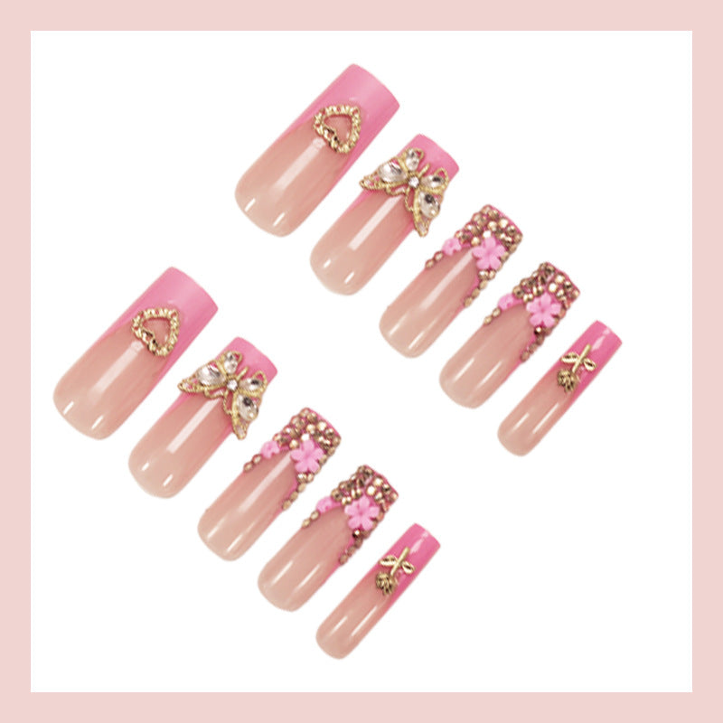 Artificial nail extension with glamorous embellishments Kalsten