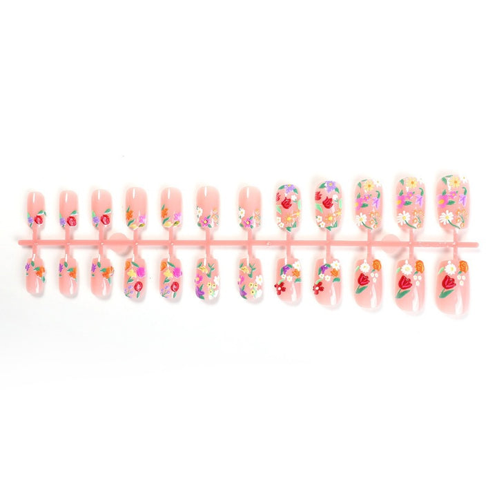 Acrylic nail set with floral motifs and glitter accents Kalsten