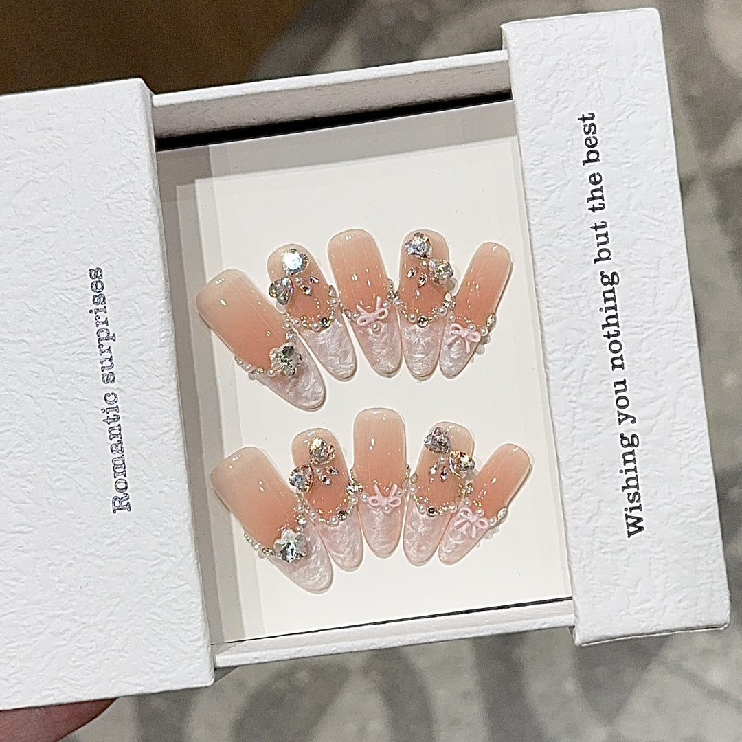 Artificial nails with romantic rhinestone details Kalsten