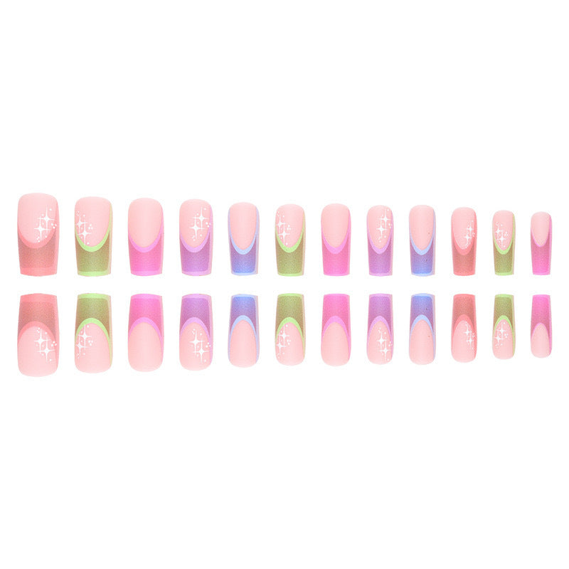 Acrylic nail set with colorful geometric designs and glitter accents Kalsten