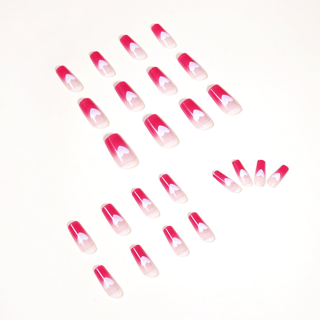 Artful nail extensions in romantic heart design Kalsten