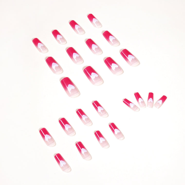Artful nail extensions in romantic heart design Kalsten