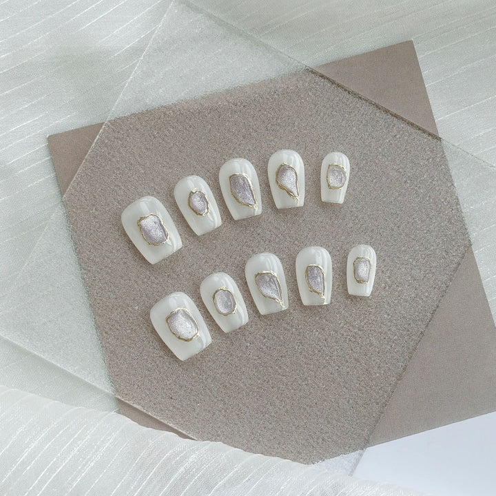 Artistic Press-On Nail Art Set with Heart and Celestial Designs