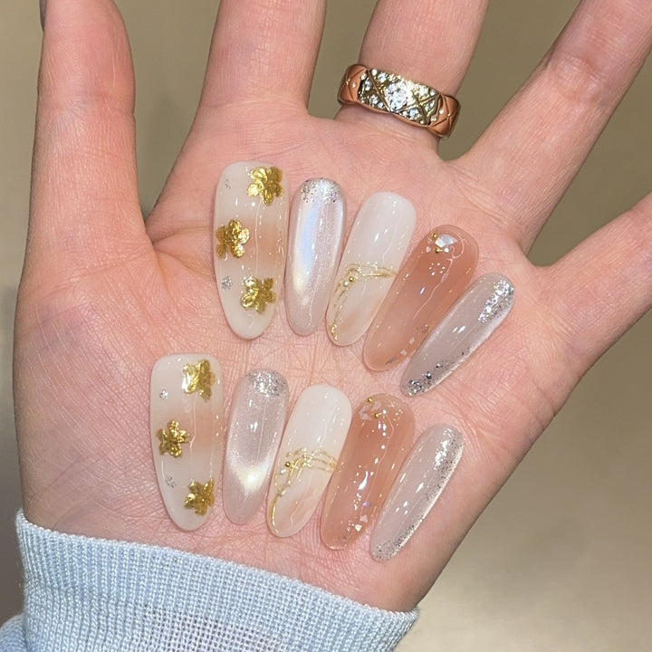 Artificial nails with floral decorations and glitter effects Kalsten