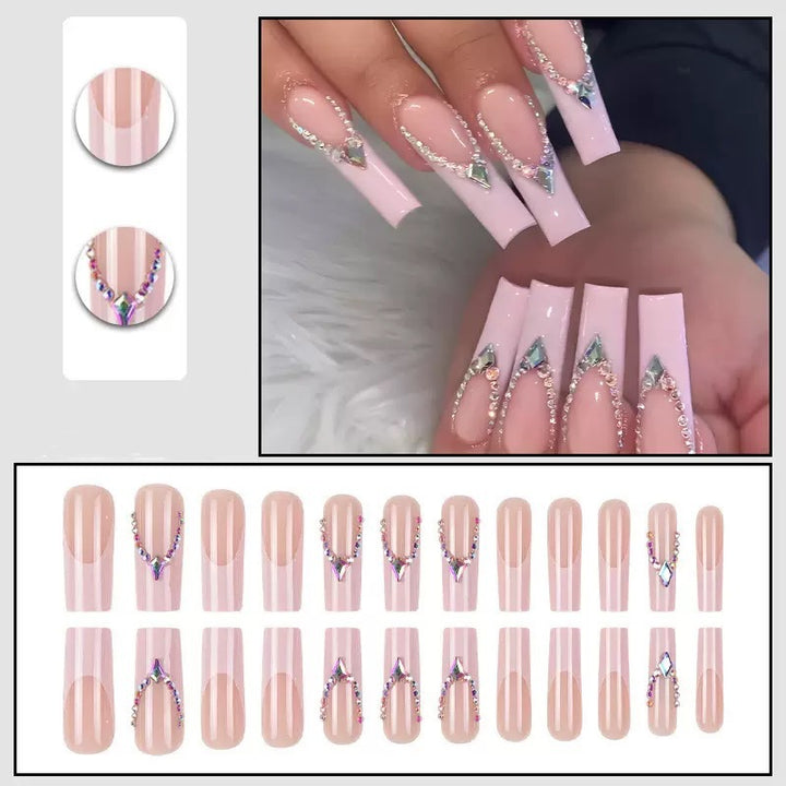 Glamorous artificial nails with sparkling rhinestone embellishments Kalsten