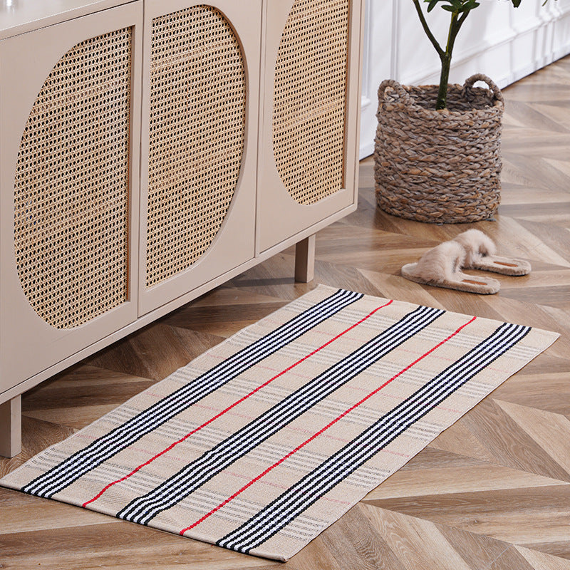 woven living room runner with fringes and geometric weave pattern