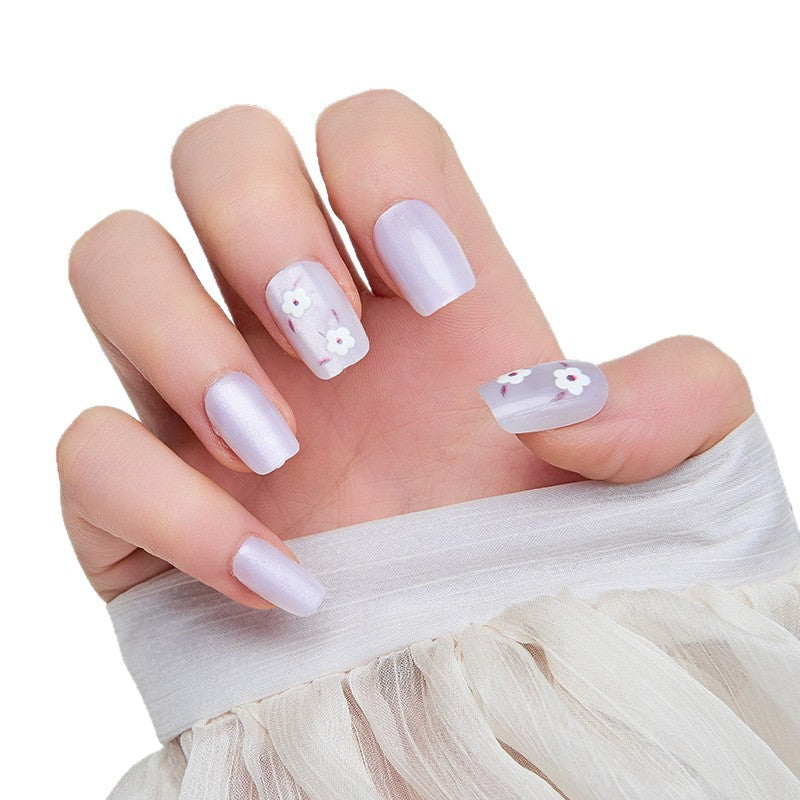 Artistic nail extensions with floral accents Kalsten