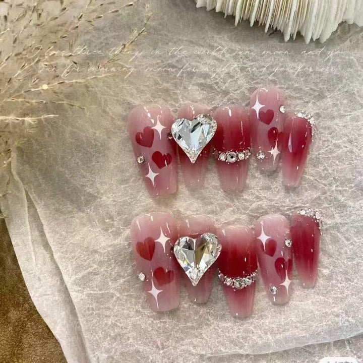 Artificial nails in romantic heart design Kalsten