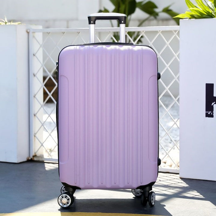 Hard shell suitcase with 360-degree wheel system and integrated safety feature Kalsten