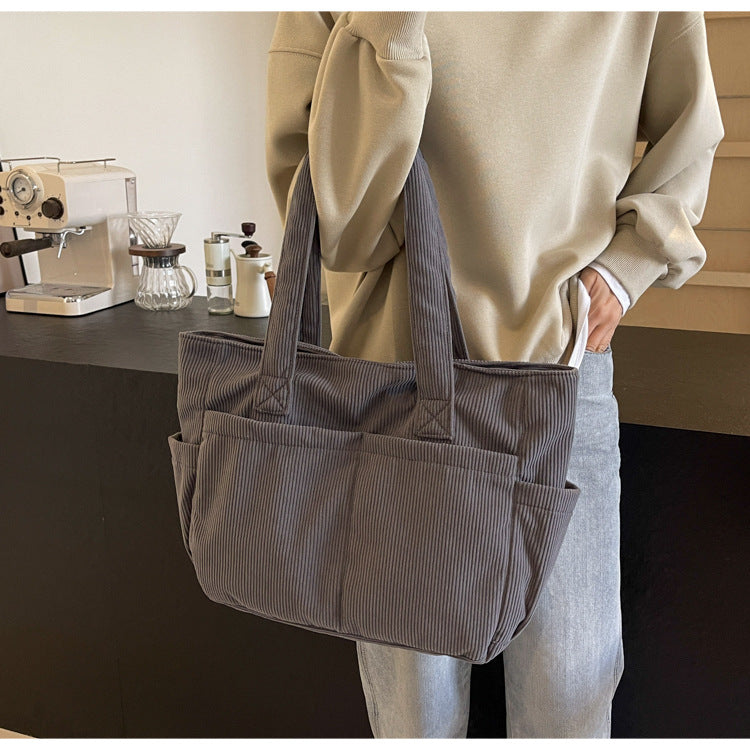 Multifunctional shoulder bag with large outer pockets Kalsten