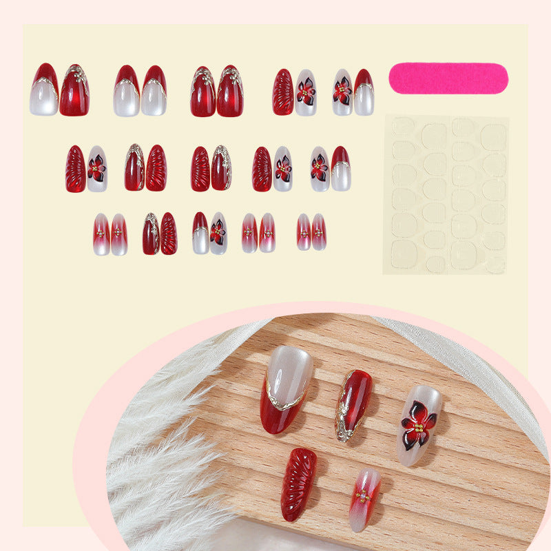 Artificial nail set with elegant floral details and glitter accents Kalsten