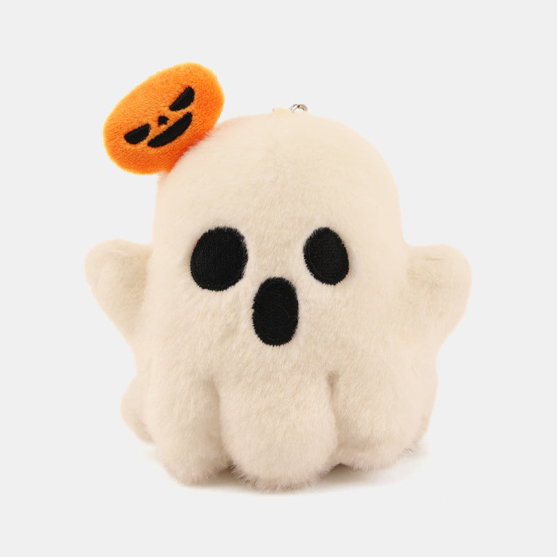 Plush figure cat on pumpkin with embroidered face