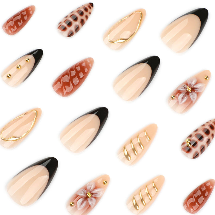 Artificial nails in modern stiletto design with golden accents Kalsten