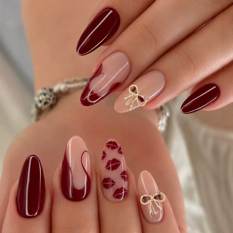 Acrylic nail set with elegant lip motifs and bow decorations Kalsten
