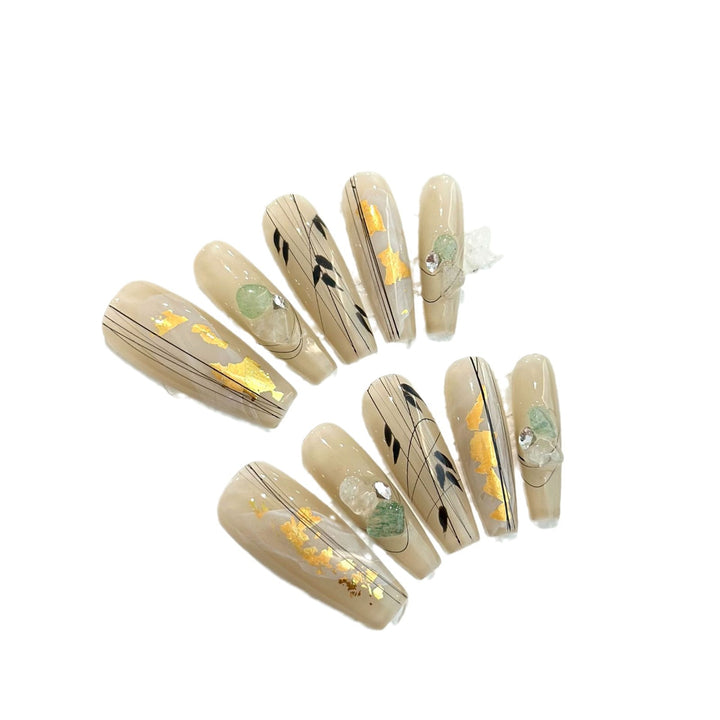 Decorative Press-On Nail Set with Artistic Accents