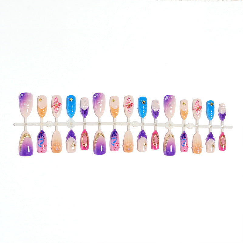 Creative nail art set with floral and glamorous embellishments Kalsten