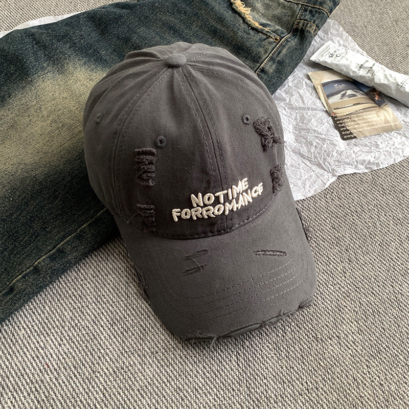 Distressed Baseball Cap with Unique Embroidery