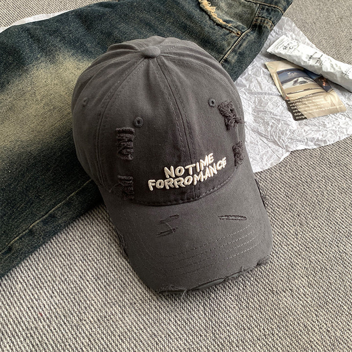 Distressed Baseball Cap with Unique Embroidery