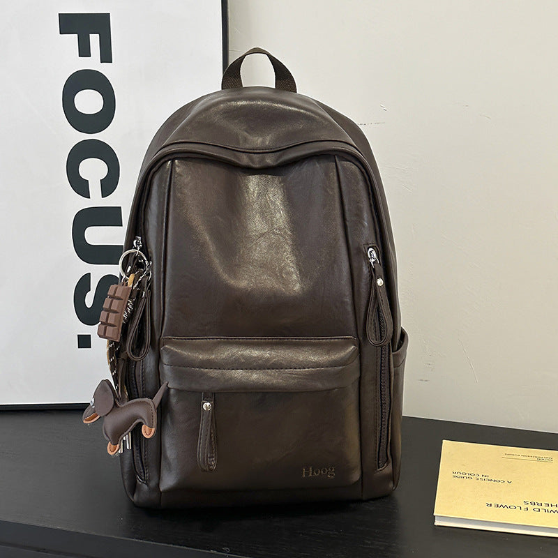 Durable Leather Backpack with Multi-Compartment Design