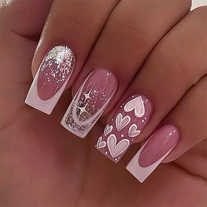 Artful Nail Extensions with Modern Glitter Design and Heart Accents Kalsten