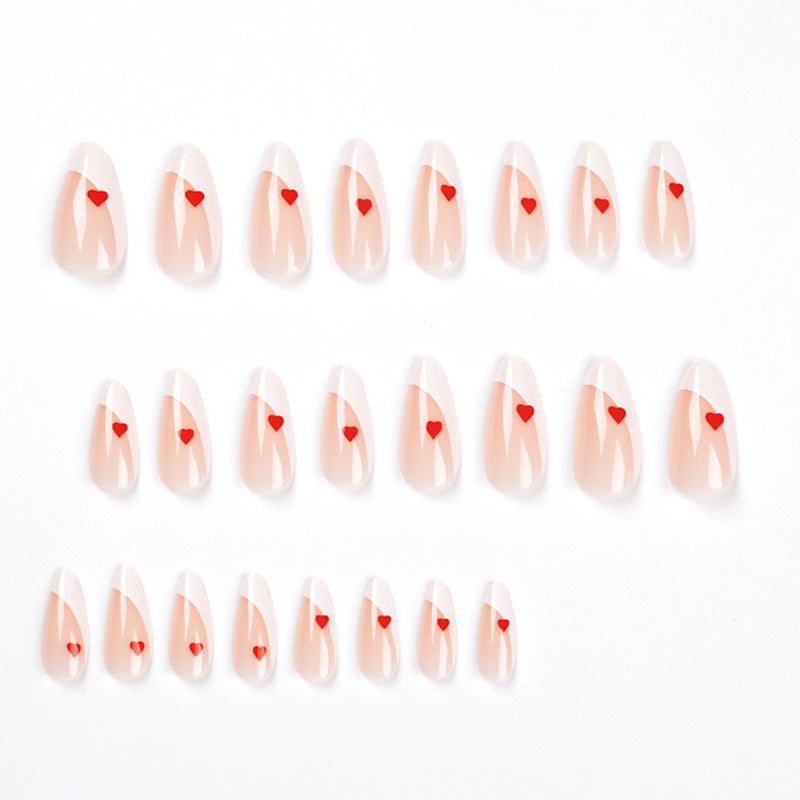 Glamorous nail art with heart decorations Kalsten