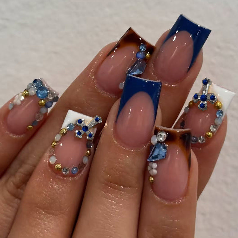 Artificial nail set with elegant stone embellishments and modern accents Kalsten