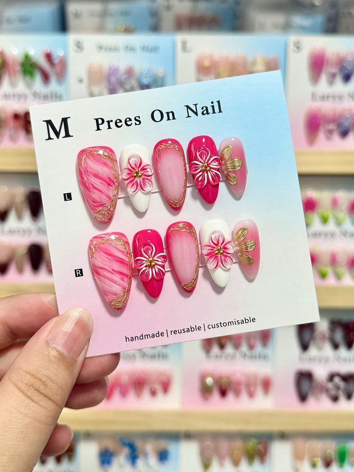 Artistic Press-On Nail Set with Floral and Green Accents