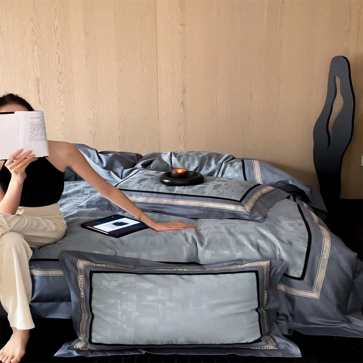 Premium bed set made of heavy cotton satin with woven mosaic relief and double stitched hem