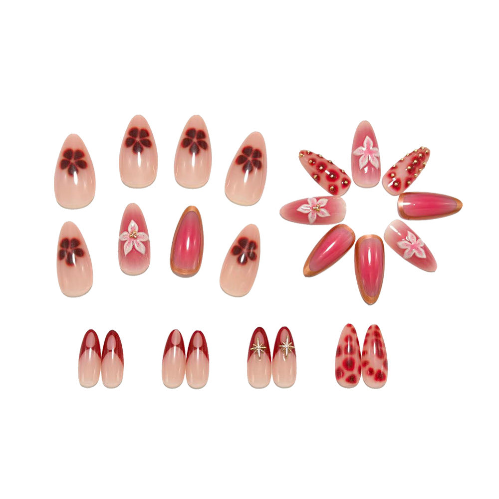 Artificial nails with floral and glitter accents Kalsten