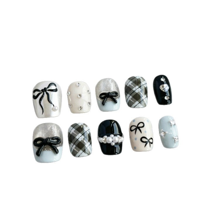 Artificial nails with elegant bows and rhinestones Kalsten
