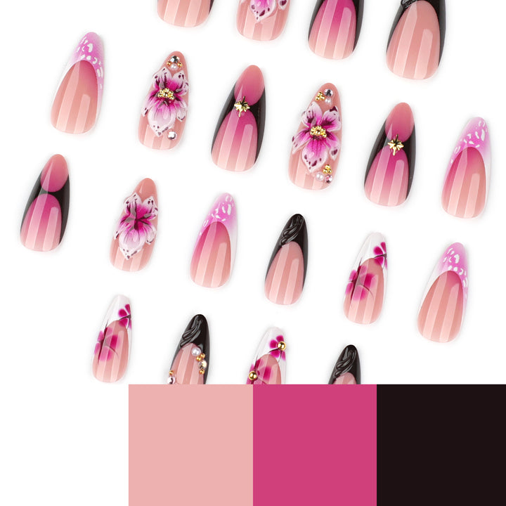 Artful stiletto nails with blooming design and glitter accents Kalsten
