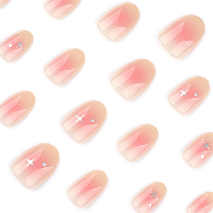 Artful nail extensions with shiny rhinestone accents Kalsten