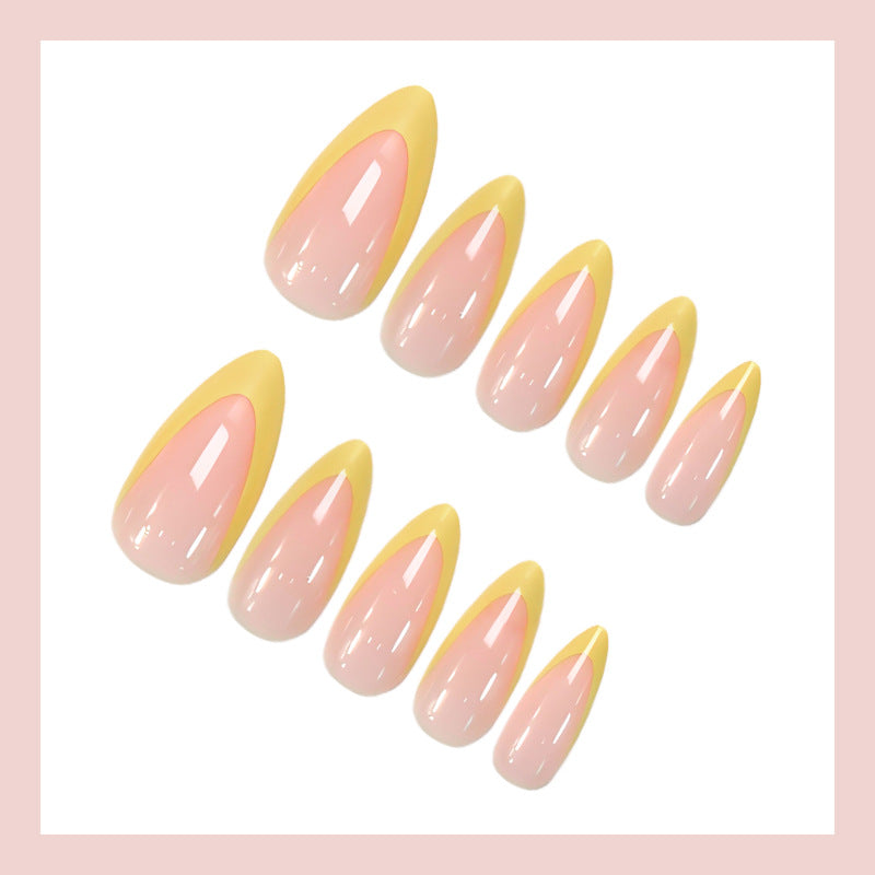 Artificial nails with elegant French tip in yellow Kalsten