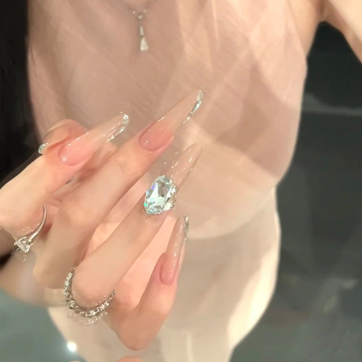 Elegant Stiletto Press-On Nail Design with Gemstone Accents Kalsten