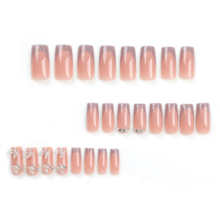 Artful Nail Extensions with Glitter and Decorative Accents Kalsten