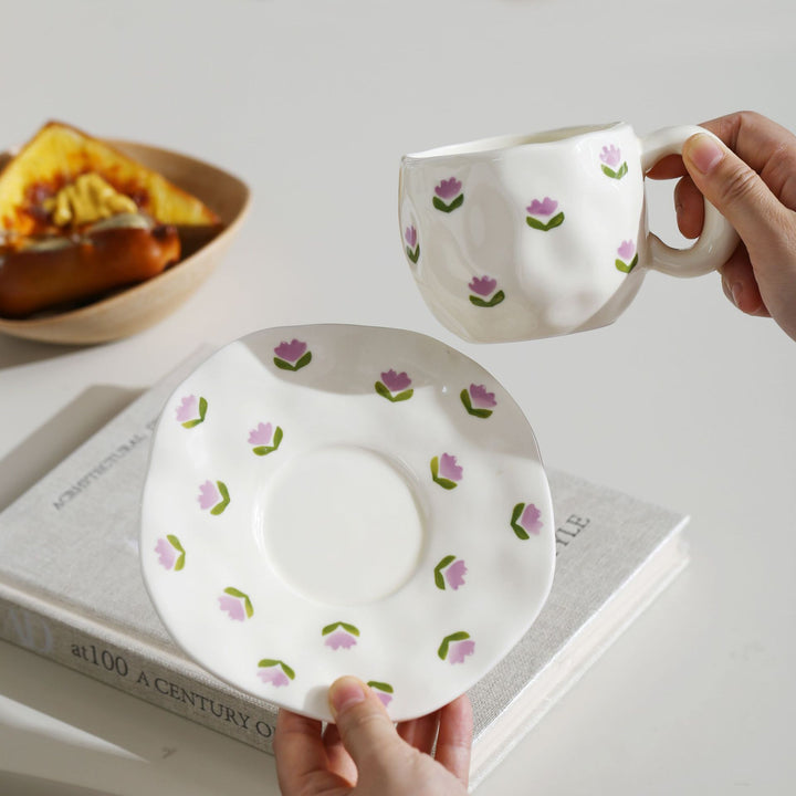 Ceramic mug with hand-painted tulip pattern and organic shape