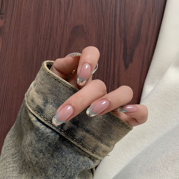 Artificial nails with shimmering glitter and elegant French-tip design Kalsten