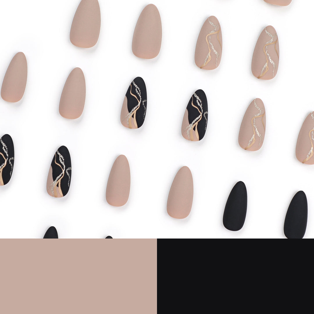 Artful nail designs with elegant gold accent Kalsten