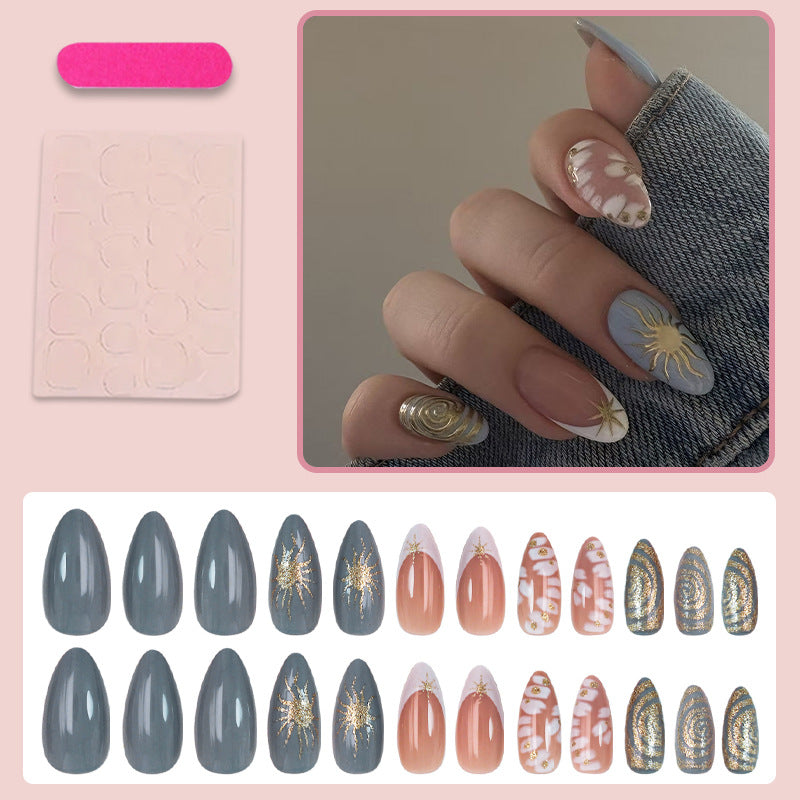 Nail art set with elegant gold accents and creative design Kalsten
