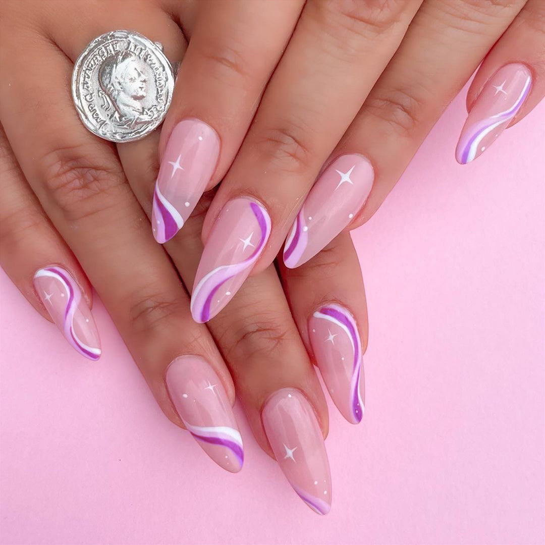 Elegant artistic nail extensions with delicate gradient and accented lines Kalsten