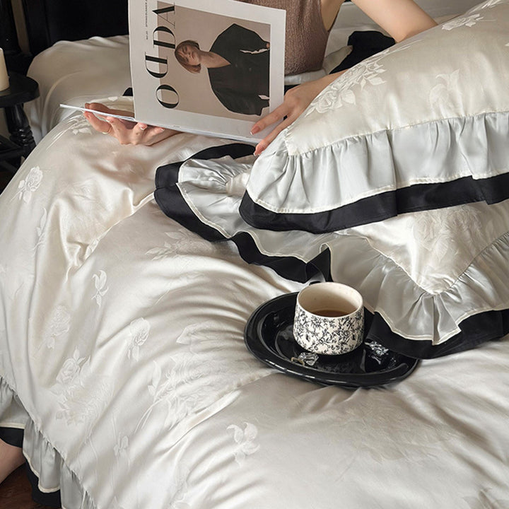 Luxurious cotton satin bedding set with decorative ruffle and contrasting edge finishing